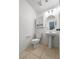 Half bathroom with vanity sink, toilet, and neutral decor at 2125 Stone Well Rd, North Las Vegas, NV 89031