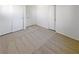 This simple bedroom boasts neutral carpet and plenty of closet space for a clean, inviting space at 2125 Stone Well Rd, North Las Vegas, NV 89031