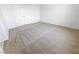 Neutral bedroom with plush carpeting and a double door closet at 2125 Stone Well Rd, North Las Vegas, NV 89031