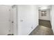 Hallway with tile flooring, closet, and bedroom at 2125 Stone Well Rd, North Las Vegas, NV 89031