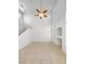 Bright living room with tile floors, a ceiling fan, and tall windows at 2125 Stone Well Rd, North Las Vegas, NV 89031
