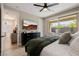 Primary bedroom featuring patio access with a comfortable seating area and ensuite bathroom at 2151 Noble Perch St, Las Vegas, NV 89138