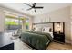Bedroom featuring patio access with a comfortable seating area at 2151 Noble Perch St, Las Vegas, NV 89138