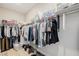 Walk-in closet with ample hanging and storage space for clothing and accessories at 2151 Noble Perch St, Las Vegas, NV 89138