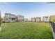 Spacious community green space surrounded by modern homes and secure fencing at 2151 Noble Perch St, Las Vegas, NV 89138