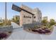Elegant community entrance showcasing modern architecture and lush landscaping, named 'Blacktail' at 2151 Noble Perch St, Las Vegas, NV 89138