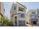 Modern two-story home with a balcony, covered entry, and two car garage at 2151 Noble Perch St, Las Vegas, NV 89138