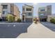 Contemporary two-story home showcasing modern architecture, a private balcony, and a garage at 2151 Noble Perch St, Las Vegas, NV 89138