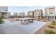 Community game area featuring ping pong table and bean bag toss at 2151 Noble Perch St, Las Vegas, NV 89138