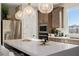 Kitchen island with stainless steel appliances and mountain views in a modern kitchen at 2151 Noble Perch St, Las Vegas, NV 89138