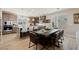 Modern kitchen showcases a large island with seating, stainless steel appliances, and elegant pendant lights at 2151 Noble Perch St, Las Vegas, NV 89138