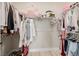 A walk-in closet, neatly arranged, offers ample storage space for a tidy and organized wardrobe at 2151 Noble Perch St, Las Vegas, NV 89138