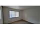 Bright bedroom with a window allowing natural light to illuminate the space at 2216 Short Pine Dr, Las Vegas, NV 89108