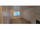 Cozy bedroom with plush carpet and natural light at 2216 Short Pine Dr, Las Vegas, NV 89108