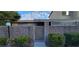 Charming front entrance with brick wall, gate, and manicured bushes at 2216 Short Pine Dr, Las Vegas, NV 89108