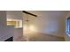 Spacious living room with tile floors, fan, and fireplace at 2216 Short Pine Dr, Las Vegas, NV 89108