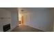 Neutral living room showcasing a fireplace with access to bathroom and closet at 2216 Short Pine Dr, Las Vegas, NV 89108