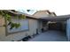 This side yard features a covered patio and room for outdoor enjoyment at 2216 Short Pine Dr, Las Vegas, NV 89108