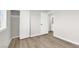 Bedroom with hardwood floors, closet, and lots of natural light at 2480 Old Forge Ln # 74, Las Vegas, NV 89121