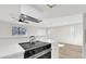 Modern kitchen with stainless steel appliances and white cabinets and countertops at 2480 Old Forge Ln # 74, Las Vegas, NV 89121