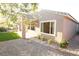 Attractive backyard featuring an artificial lawn area and low-maintenance desert landscaping at 2623 Red Planet St, Henderson, NV 89044
