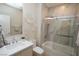 Bright bathroom with a tub-shower combo and decorative wall art at 2623 Red Planet St, Henderson, NV 89044