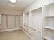 Spacious walk-in closet with custom shelves and ample storage space at 2623 Red Planet St, Henderson, NV 89044