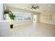Open concept living room features backyard views through sliding glass doors and stylish recessed lighting at 2623 Red Planet St, Henderson, NV 89044