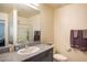 Updated bathroom features granite countertops and a modern glass-enclosed shower at 2629 Mocha Pearl Ct, North Las Vegas, NV 89086