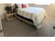 Well-lit bedroom featuring a bed with soft bedding at 2629 Mocha Pearl Ct, North Las Vegas, NV 89086