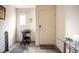 Well-lit entryway with a desk and a modern front door at 2629 Mocha Pearl Ct, North Las Vegas, NV 89086