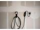 Garage equipped with EV charger for convenient electric vehicle charging at 2629 Mocha Pearl Ct, North Las Vegas, NV 89086