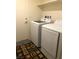 Convenient laundry room with modern washer and dryer units at 2629 Mocha Pearl Ct, North Las Vegas, NV 89086
