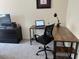 Cozy office space with a desk, chair, and natural light at 2629 Mocha Pearl Ct, North Las Vegas, NV 89086