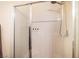 Modern shower with a sleek glass door and convenient built-in shelves at 2629 Mocha Pearl Ct, North Las Vegas, NV 89086