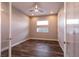 Minimalist bedroom features two small windows, neutral walls and flooring at 2680 Nevada Agave Ln, Las Vegas, NV 89138