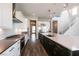 A chef's dream kitchen with stainless steel appliances, ample counter space, and a center island at 2680 Nevada Agave Ln, Las Vegas, NV 89138