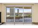 Balcony with sliding glass doors offering panoramic city views and access to outdoor space at 2777 Paradise Rd # 2302, Las Vegas, NV 89109