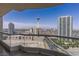 Wide city views from balcony, featuring the skyline with Stratosphere, tall buildings and a clear sky at 2777 Paradise Rd # 2302, Las Vegas, NV 89109