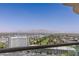 Expansive balcony overlooking the city, featuring picturesque mountain views in the distance at 2777 Paradise Rd # 2302, Las Vegas, NV 89109