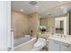 Well-appointed bathroom with a soaking tub, marble countertop, and modern fixtures at 2777 Paradise Rd # 2302, Las Vegas, NV 89109