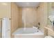 Elegant bathroom featuring a soaking tub and neutral tile surround at 2777 Paradise Rd # 2302, Las Vegas, NV 89109