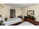 Bright bedroom featuring hardwood floors, twin beds, and bright sunlight at 2777 Paradise Rd # 2302, Las Vegas, NV 89109