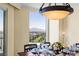 Elegantly staged dining room showcasing city views, modern lighting and an inviting atmosphere at 2777 Paradise Rd # 2302, Las Vegas, NV 89109