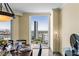 This dining room has large windows with views of the city skyline at 2777 Paradise Rd # 2302, Las Vegas, NV 89109