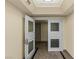 Elegant elevator foyer boasting a decorative ceiling feature and granite flooring, enhancing the entry's sophisticated appeal at 2777 Paradise Rd # 2302, Las Vegas, NV 89109