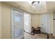 Hallway entrance featuring a sitting chair and textured doors at 2777 Paradise Rd # 2302, Las Vegas, NV 89109