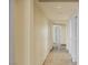 Long hallway of a condo with clean white doors at 2777 Paradise Rd # 2302, Las Vegas, NV 89109