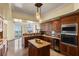 Beautiful kitchen boasts granite countertops, stainless appliances, wooden cabinets and breakfast bar at 2777 Paradise Rd # 2302, Las Vegas, NV 89109
