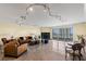 Spacious living room with fireplace, balcony access and city view at 2777 Paradise Rd # 2302, Las Vegas, NV 89109